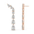 Rose gold pear diamond climber earrings angled profile, mixed brilliant cuts in curved drop design with halo accents, luxurious rose gold fine jewelry
