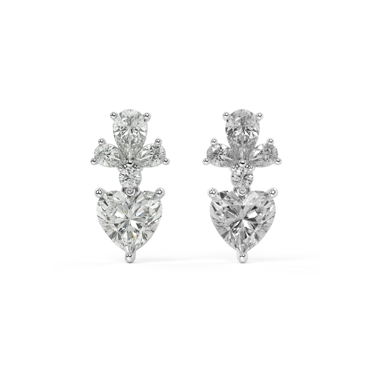 Pair of Diamore Earrings in white gold featuring fancy yellow heart lab grown diamond below blooming white floral cluster for sunny intensity contrasting cool fire accents on white background.