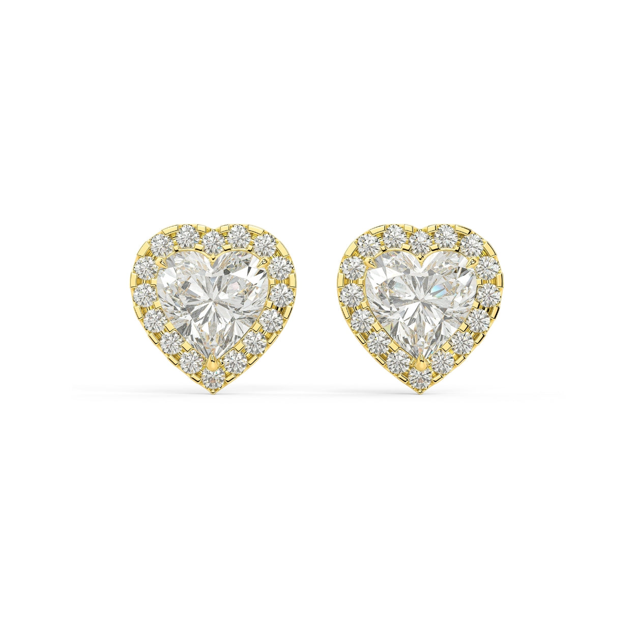 Pair of Heart Halo lab grown diamond earrings in yellow gold showcasing heart cut center magnified by halo for romantic heart brilliance with emotional depth and maximum visual romance on white background.