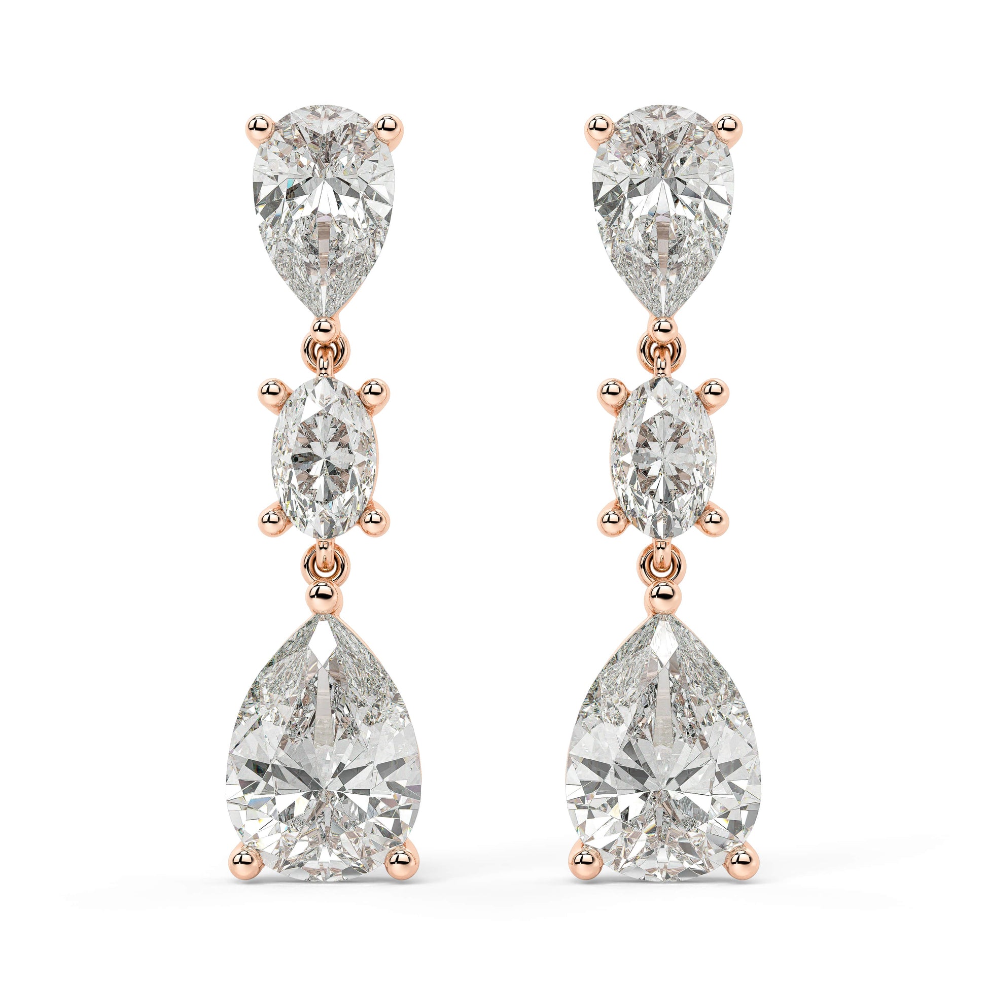 Angled shot of rose gold lab-grown diamond round solitaire earrings with brilliant center diamond, pair illustrated, trendy classic diamond studs