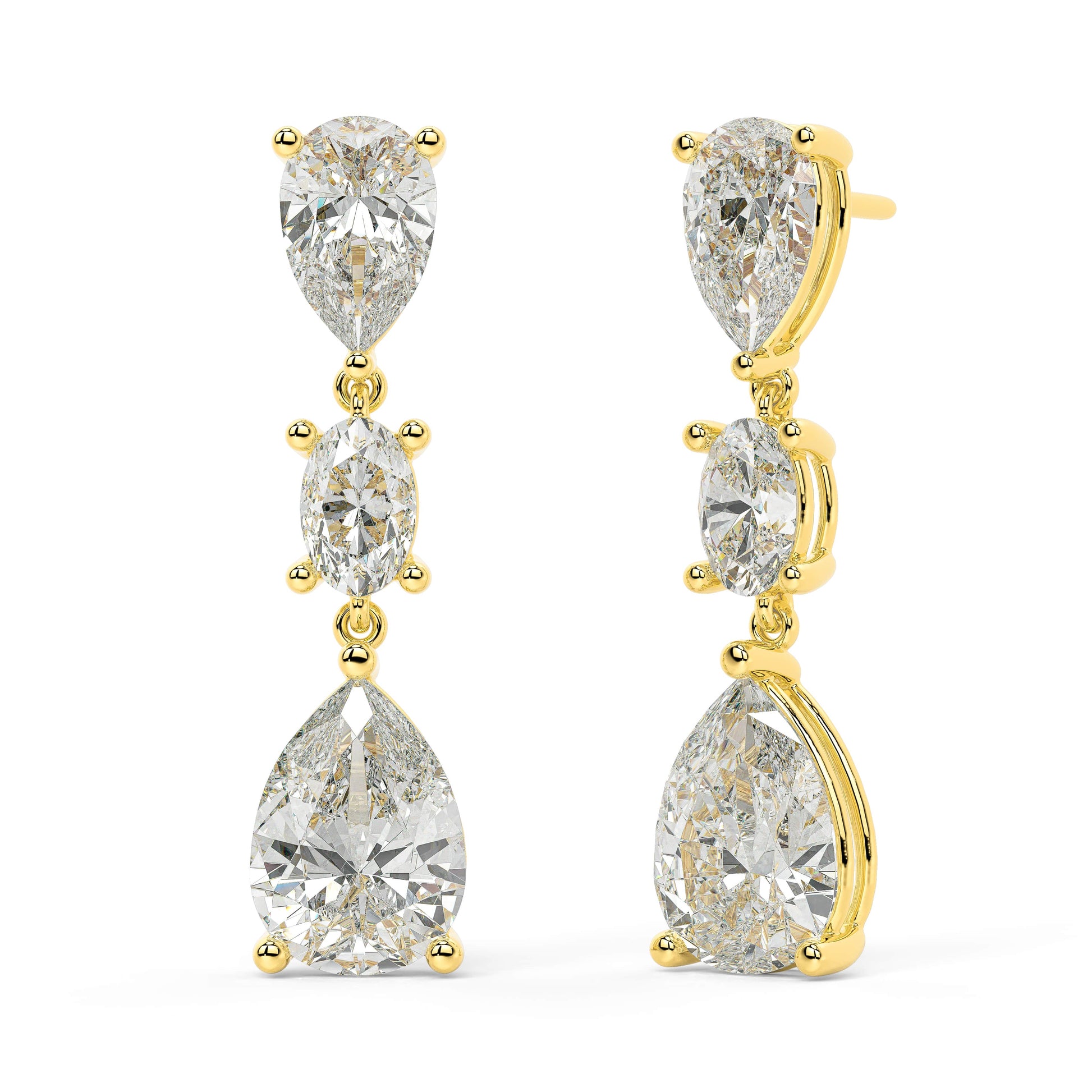 Angled view of yellow gold lab-grown diamond solitaire earrings featuring round brilliant-cut center stone, pair shown, high-end minimalist luxury jewelry