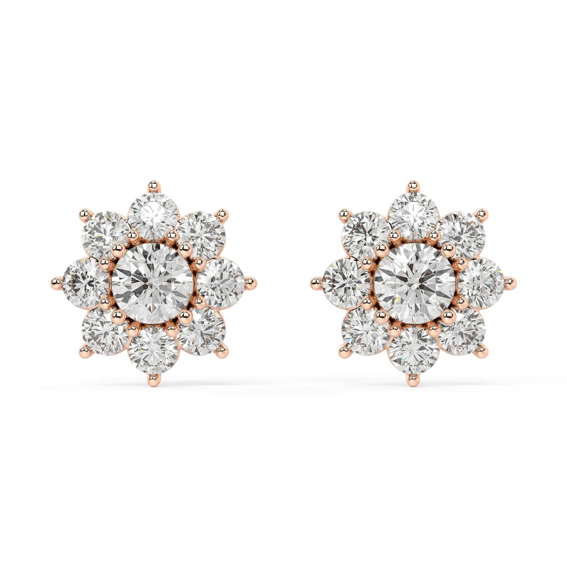 Angled shot of rose gold lab-grown diamond cluster earrings with round center and brilliant petal rounds, pair illustrated, trendy diamond earrings