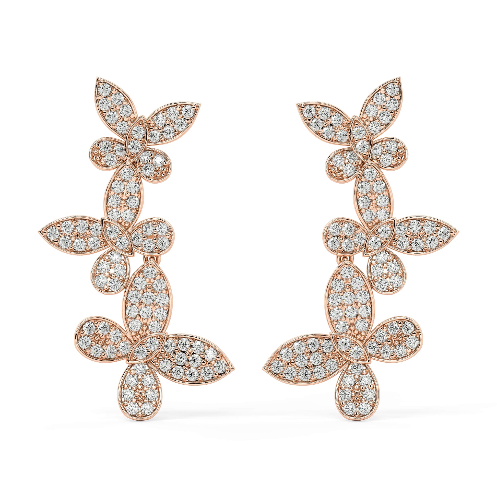 Angled shot of rose gold lab-grown diamond vine cluster earrings featuring marquise petals and pear brilliants in floral arrangement, pair illustrated, trendy diamond earrings