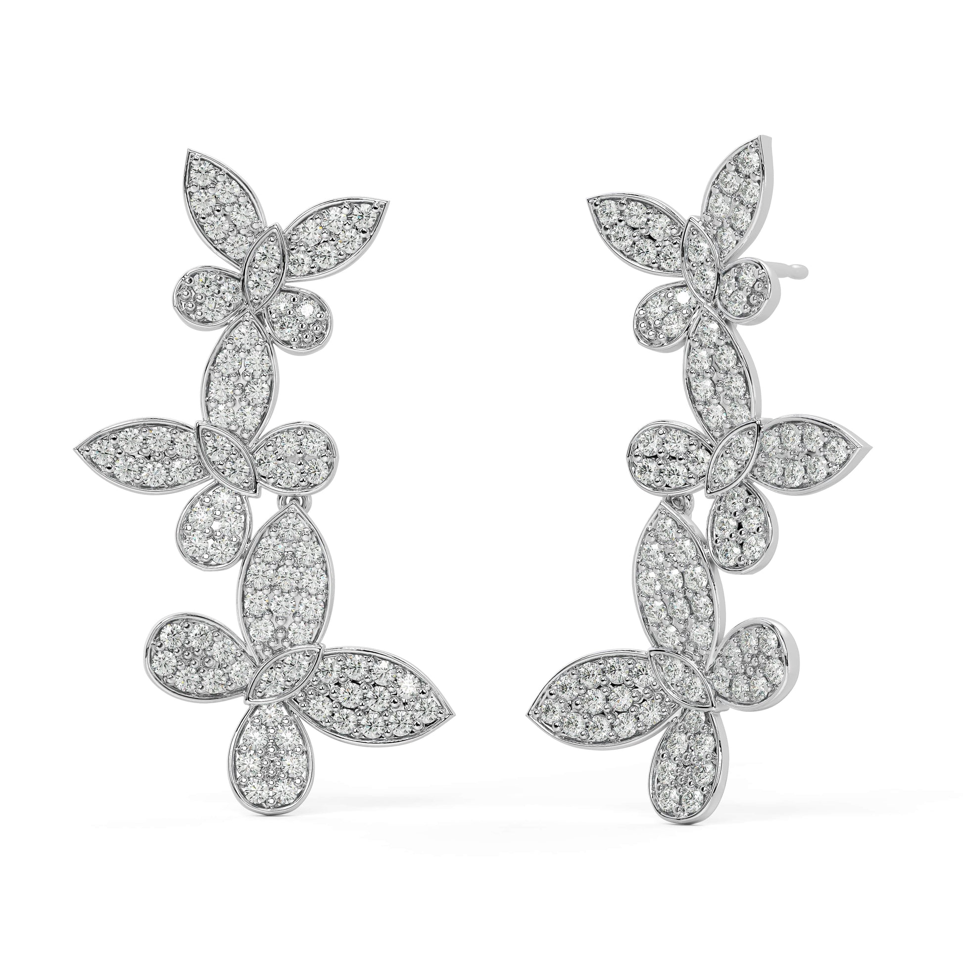 Angled perspective of white gold lab-grown diamond cascading earrings with layered marquise leaves and pear accents, pair displayed, elegant bridal diamond jewelry