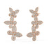 Side profile of rose gold lab-grown diamond floral vine earrings showing post and elaborate cluster setting on marquise and pear stones, exquisite diamond detail