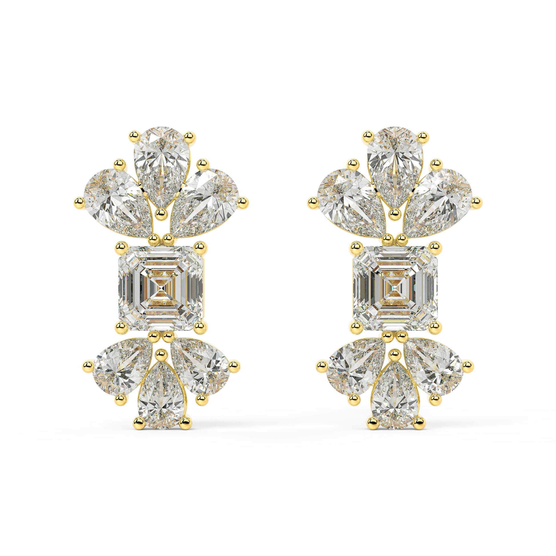 Angled view of yellow gold lab-grown diamond multi-stone stud earrings featuring emerald-cut center and pear-shaped diamonds in petal formation, pair shown, high-end luxury jewelry