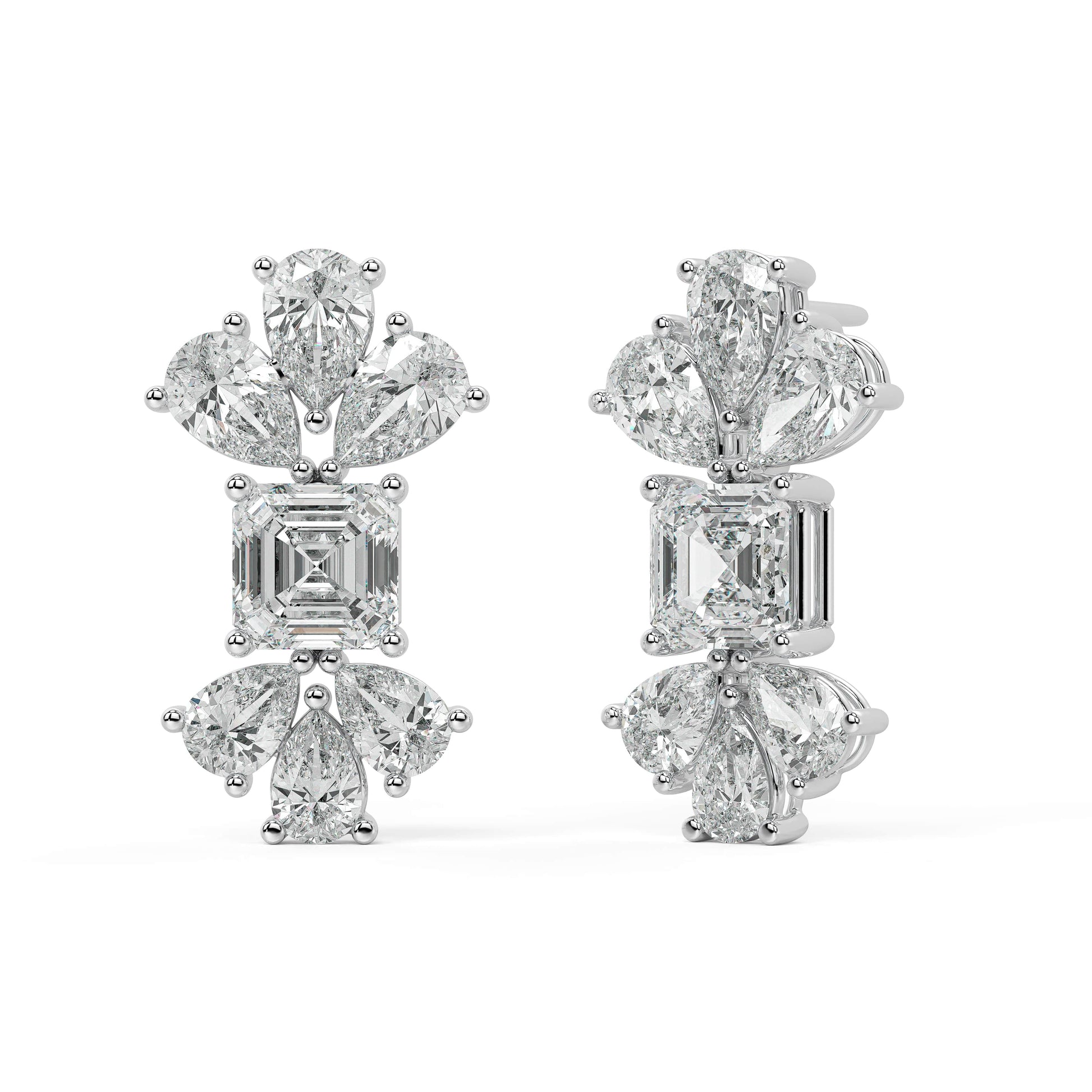 Side view of white gold lab-grown diamond earrings highlighting secure post and intricate settings on central emerald-cut and pear stones, exquisite diamond craftsmanship