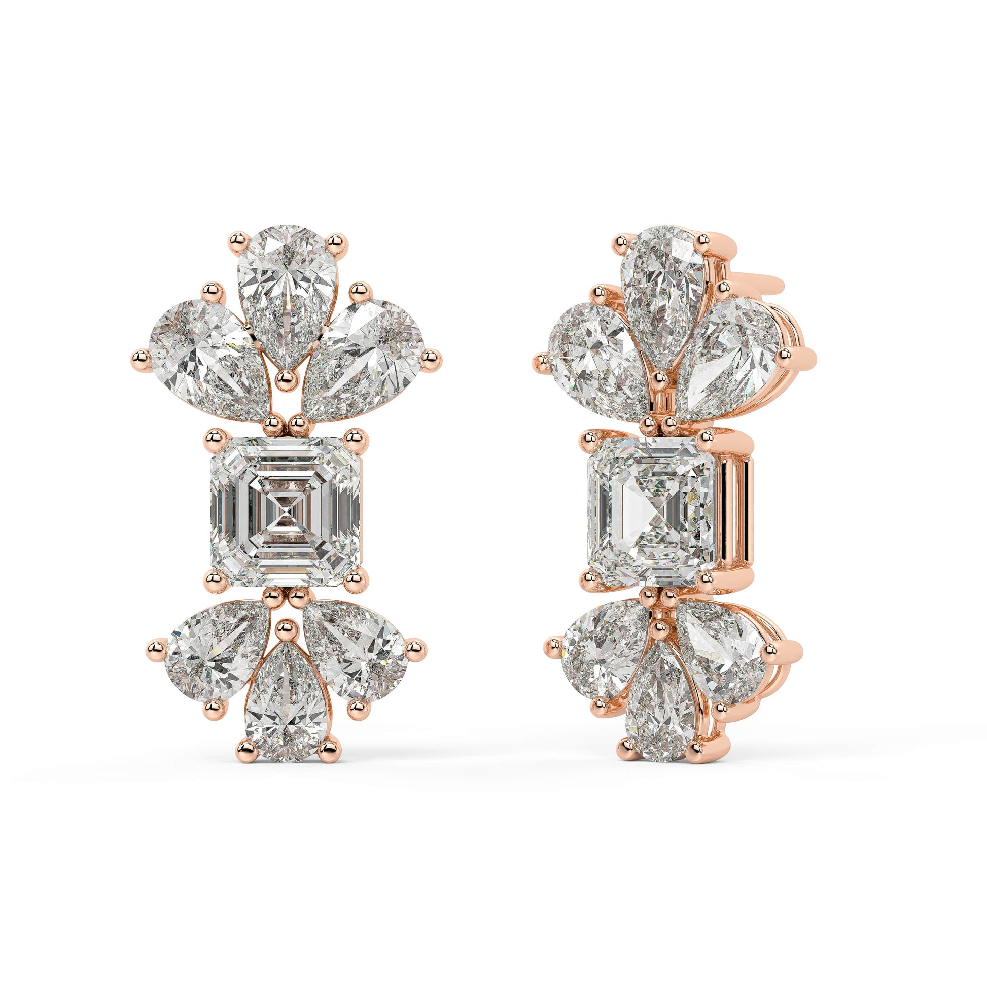 Side profile of rose gold lab-grown diamond earrings showing post and elaborate prong settings on emerald and pear stones, high-end diamond detail