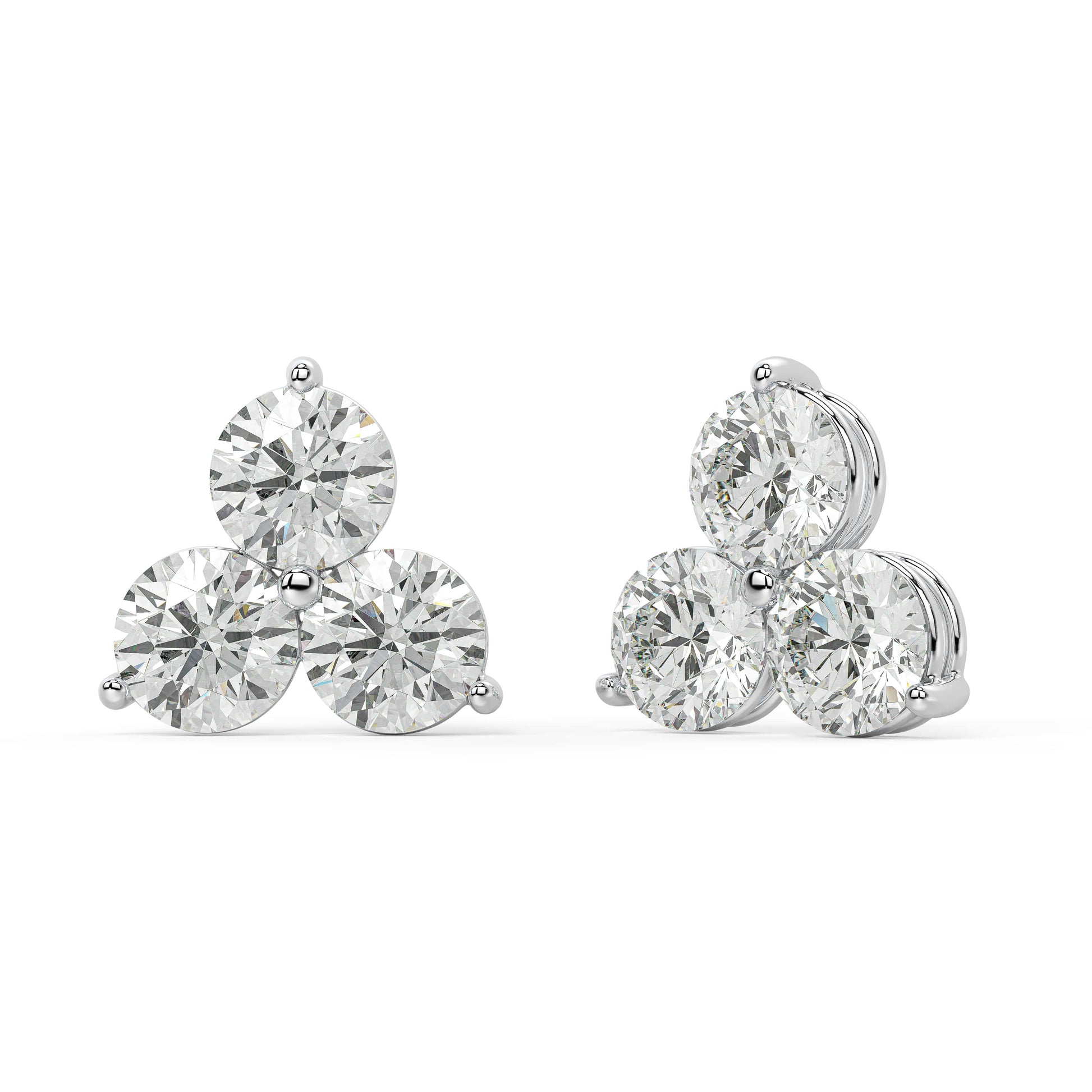 Angled view of white gold Trinity Studs earrings, versatile luxury that pairs with any necklace or shines solo for all day wear.