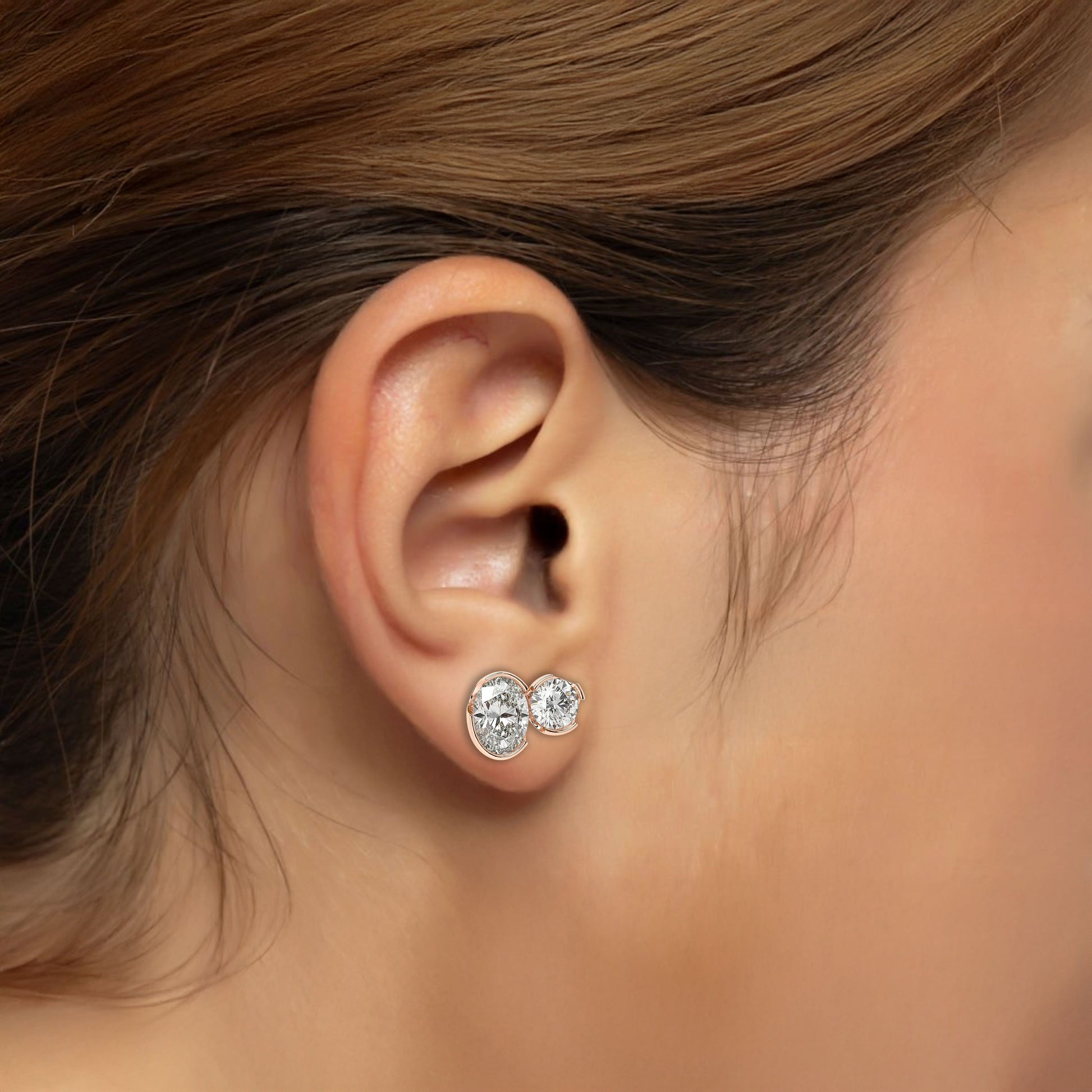 Model wearing Sorelle Studs lab grown double diamond earrings in rose gold on ear, embodying the ethical glow and snag-free innovation for women who move with confidence.