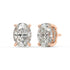 Angled perspective of rose gold Oval Hidden Halo earrings displaying four prong hold and hidden band for superior sparkle from green lab grown gems.