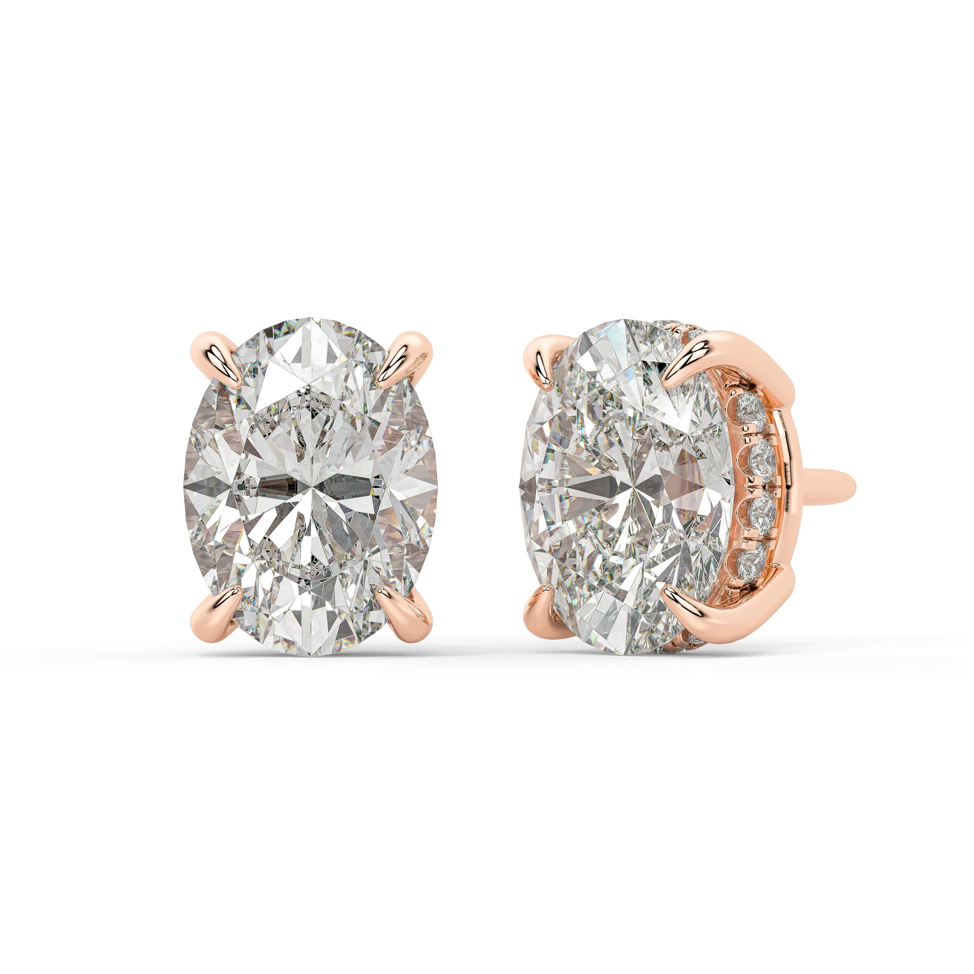 Angled perspective of rose gold Oval Hidden Halo earrings displaying four prong hold and hidden band for superior sparkle from green lab grown gems.
