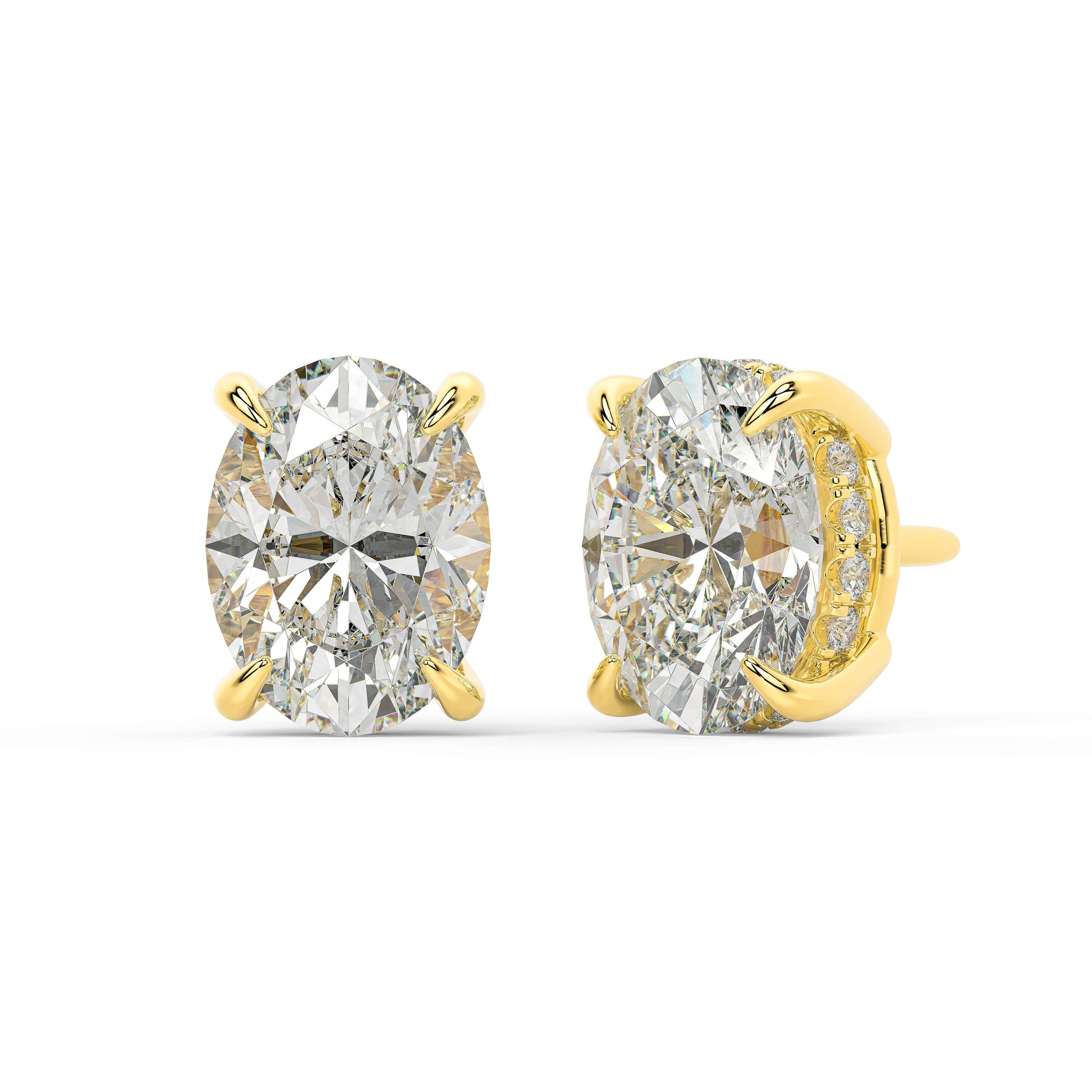 Angled view of yellow gold Oval Hidden Halo earrings revealing four prong frame and hidden band of diamonds sparking from all directions for green premium superior sparkle.