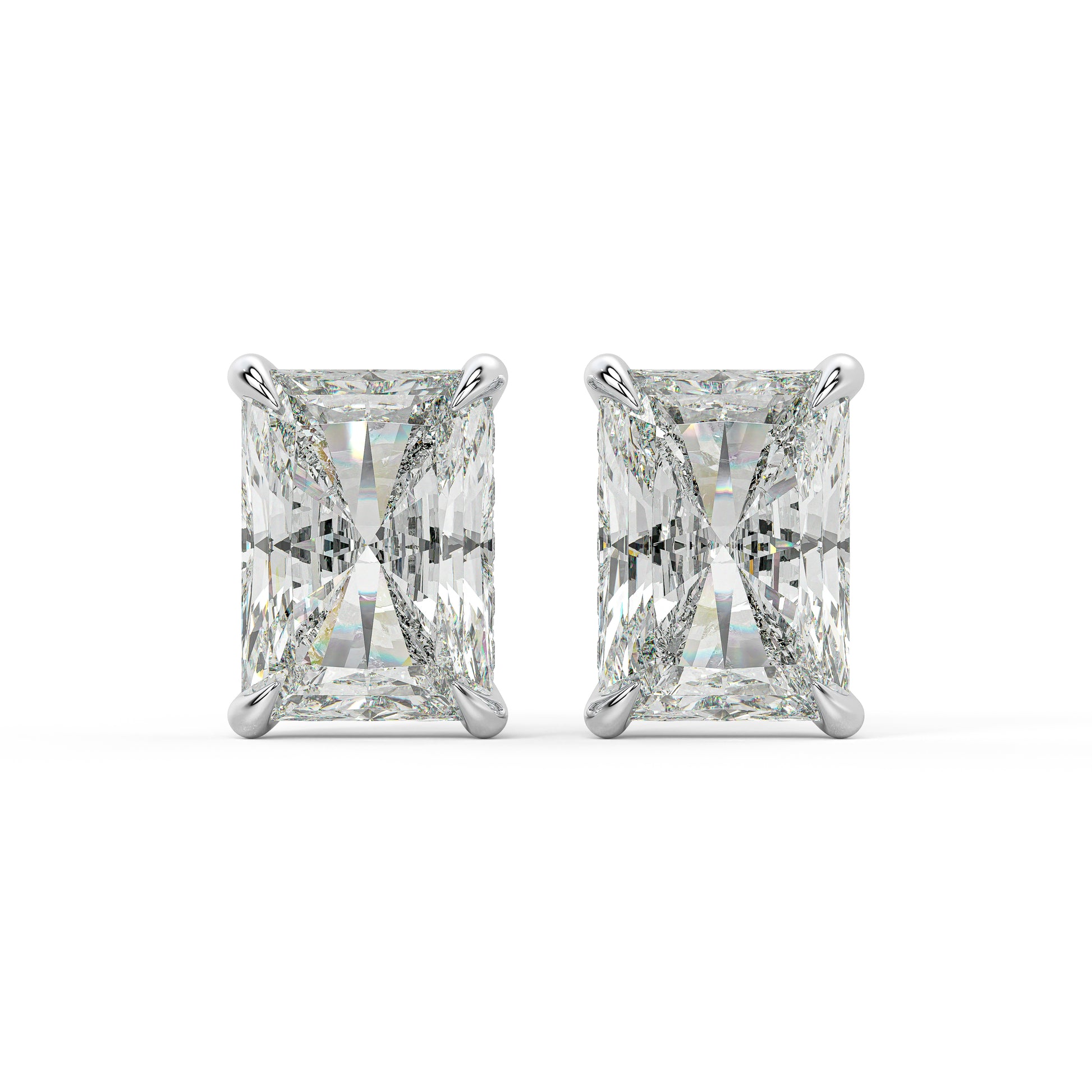 Stunning radiant-cut lab-grown diamond earrings set in classic white gold. The low-profile bezel design is complemented by a secret hidden halo for multi-angle brilliance.