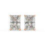 Romantic radiant-cut lab-grown diamond studs featuring a warm rose gold bezel. The sleek vertical profile and hidden halo design offer a modern twist on a classic earring style.