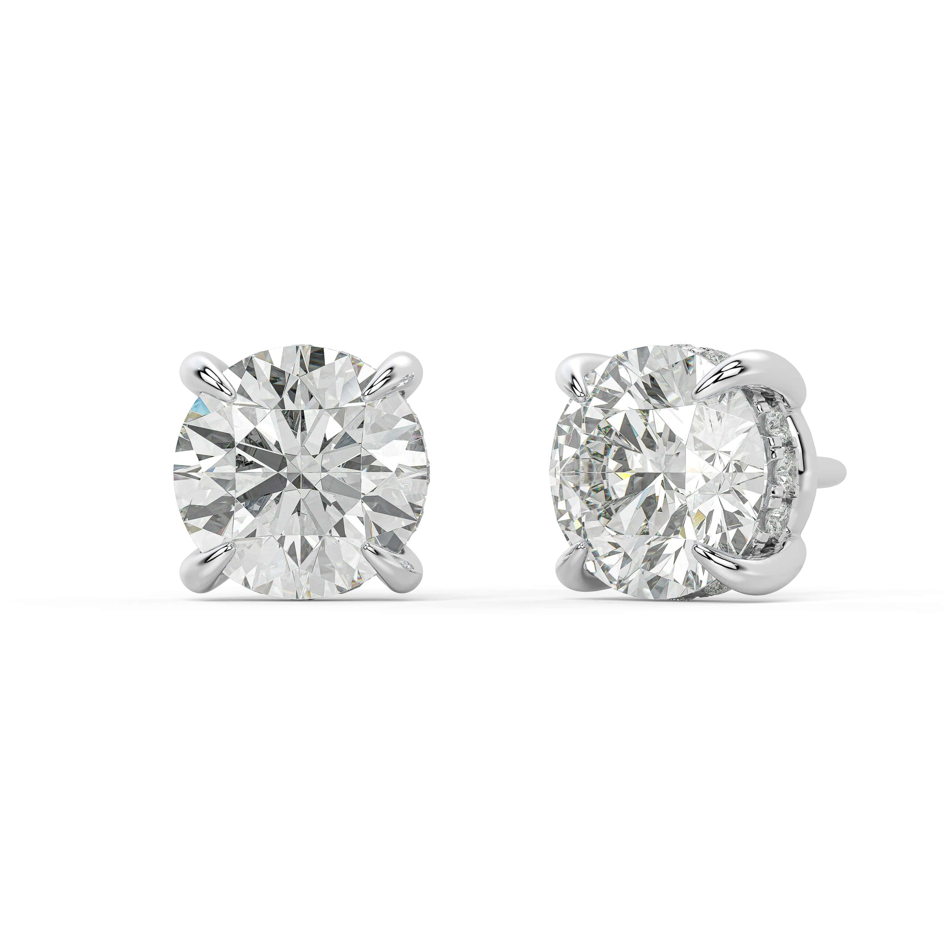 Angled front of white gold Round Hidden Halo earrings showing refined four prong and secret halo for VS plus clarity DEF color exceptional brilliance.