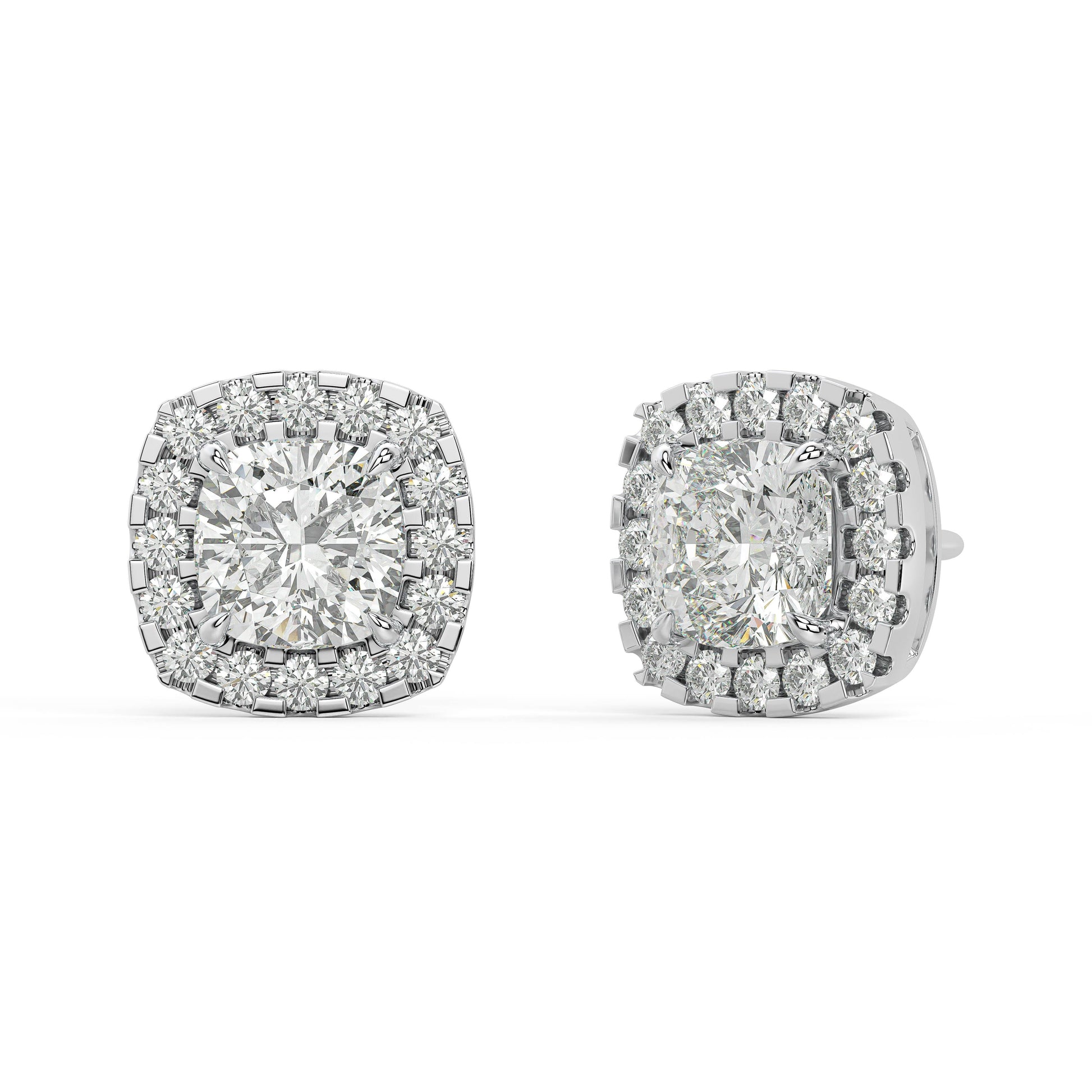 Angled view of white gold Cushion Halo earrings showing prong hold and halo with VS plus clarity DEF color 34 green gems for visual punch in slim profile.