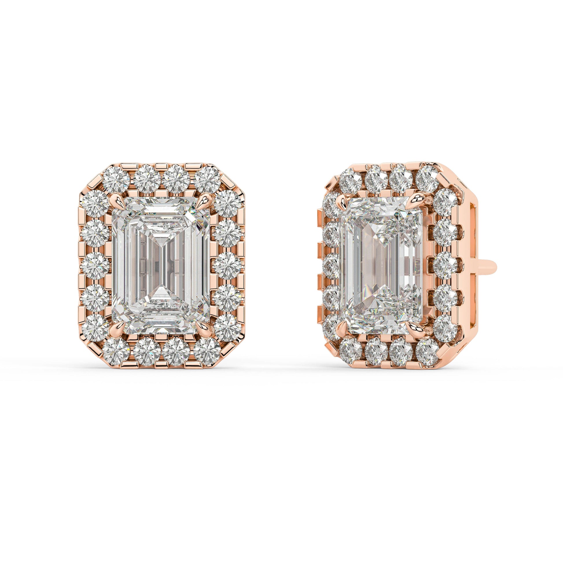 Angled view of rose gold Emerald Halo earrings displaying prong setup and surrounding diamonds adding seamless burst for all around allure with 2.39 CTW.