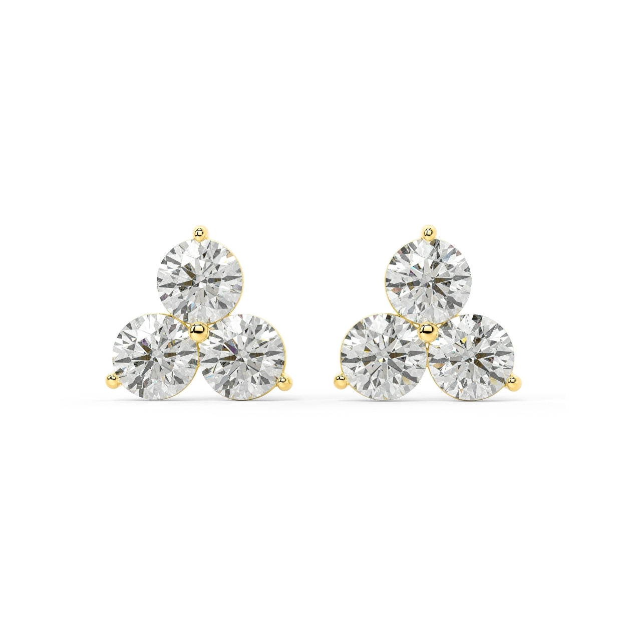 Pair of Trinity Studs lab grown diamond earrings in yellow gold, featuring three round brilliant stones in bezel setting on white background, blending sparkle and sophistication for effortless luxury.