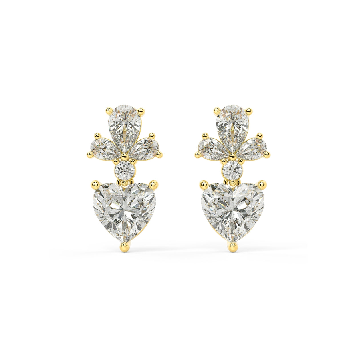 Pair of Diamore Earrings in yellow gold with fancy yellow heart lab grown diamond hanging below white floral cluster of pear marquise and round cuts for vibrant passion and crisp brilliance on white background.