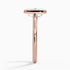 Bezel solitaire engagement ring setting in 14K rose gold, profile view