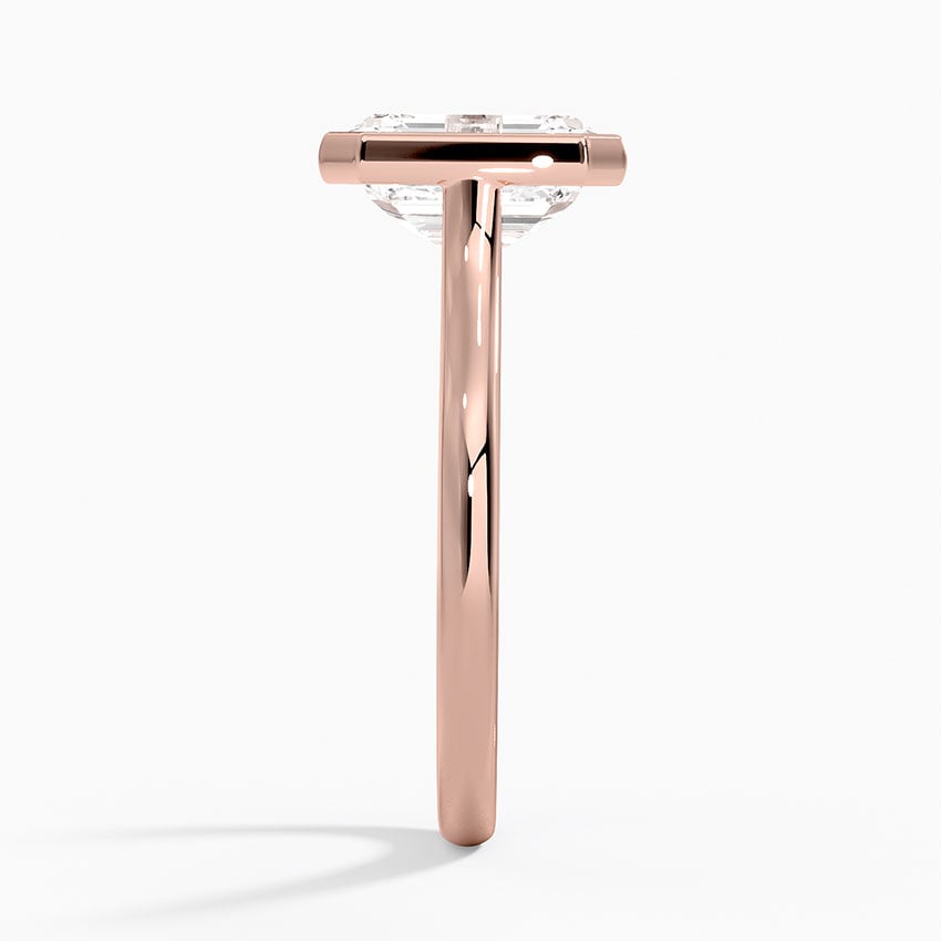 Bezel solitaire engagement ring setting in 14K rose gold, profile view