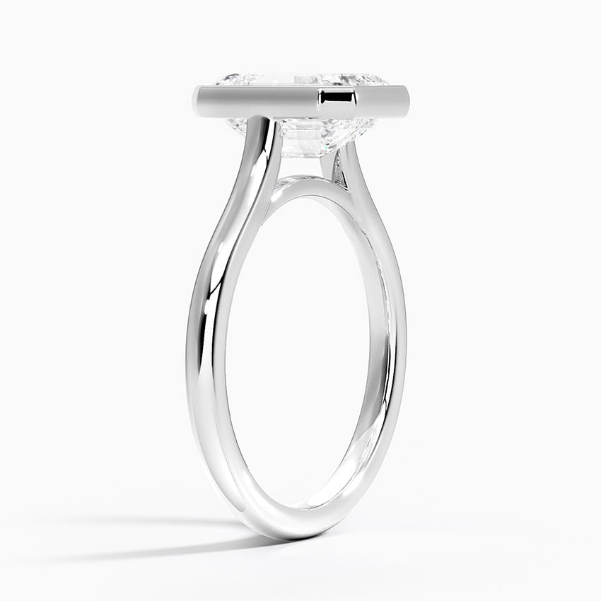 Bezel solitaire engagement ring setting in 14K white gold, angled side view