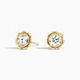 Fleur bezel stud earrings featuring a round lab-grown diamond in a sculpted floral yellow gold setting with screw back closures.