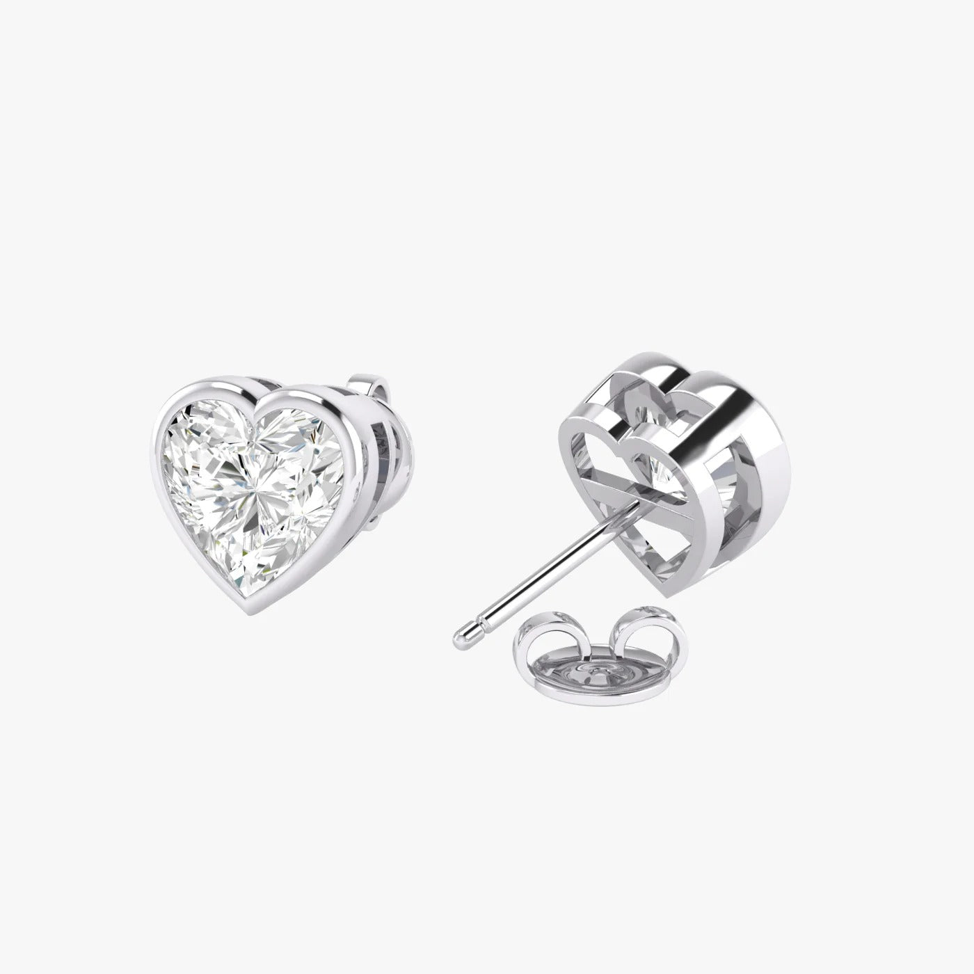 Front and back perspectives of white gold lab-grown diamond heart solitaire earrings with feminine brilliant cut, ethical fine diamond jewelry