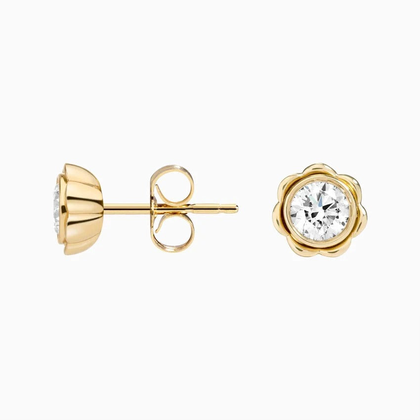 Side view of Fleur Bezel Studs featuring a round lab-grown diamond in a polished platinum bezel setting with a secure screw back closure.