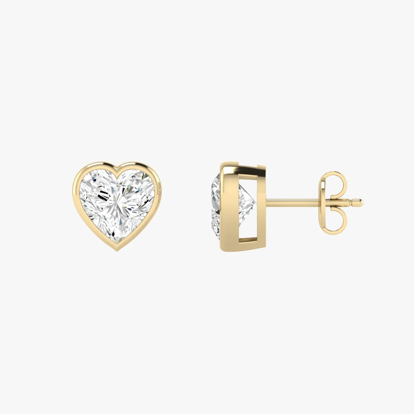 Side profile of yellow gold lab-grown diamond heart stud earrings displaying post backing and open basket prong setting, fine diamond craftsmanship