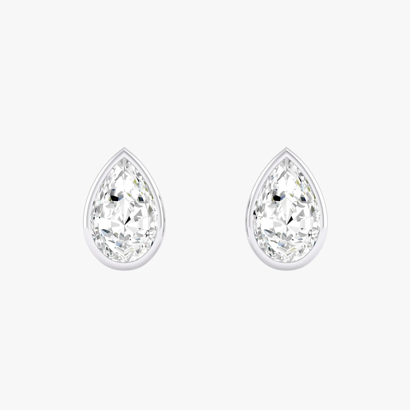 Pair of white gold lab-grown diamond pear stud earrings with single elongated pear-shaped diamond in classic setting, front view, sophisticated timeless jewelry