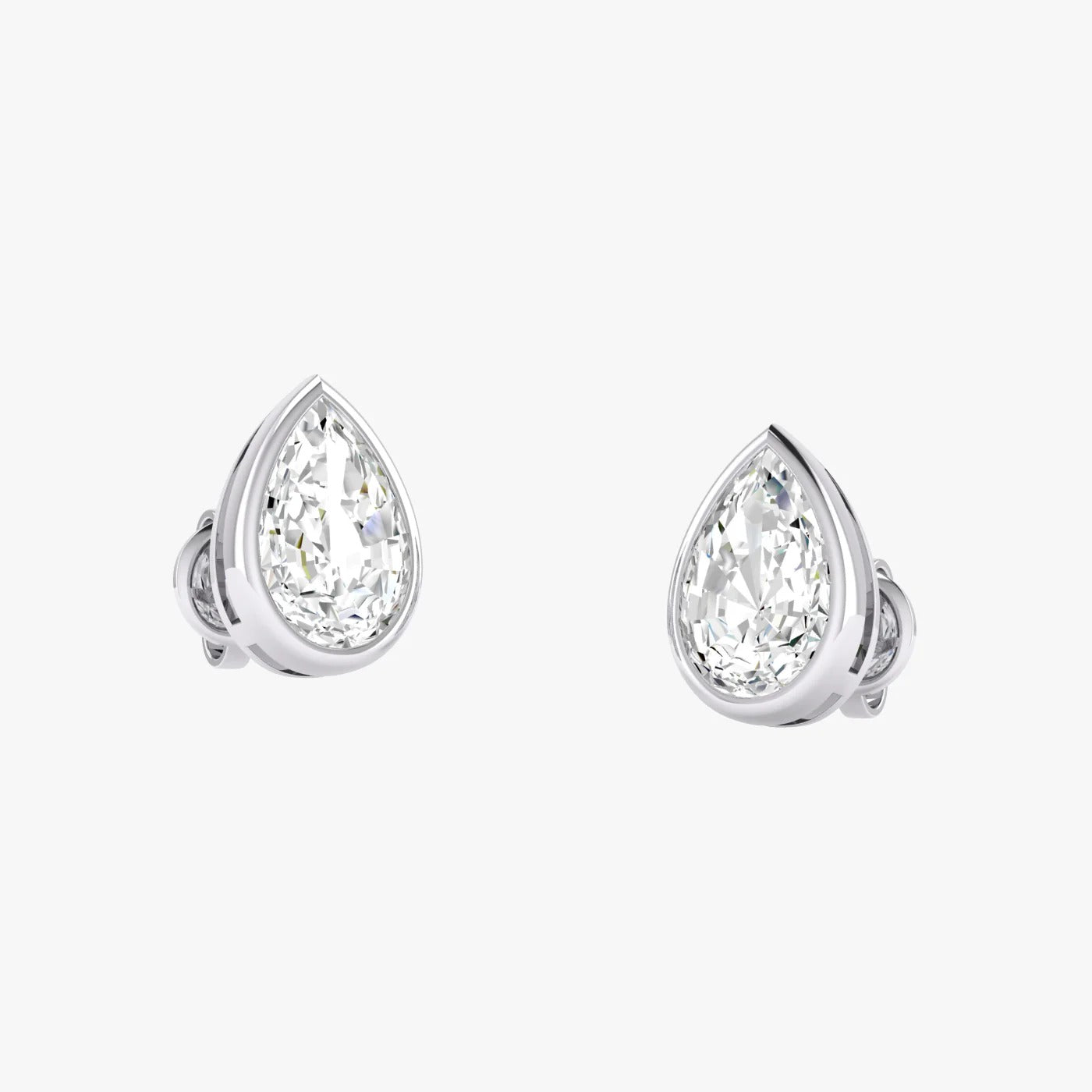 Angled perspective of white gold lab-grown diamond pear earrings with sparkling teardrop pear cut stone, pair displayed, elegant bridal diamond studs