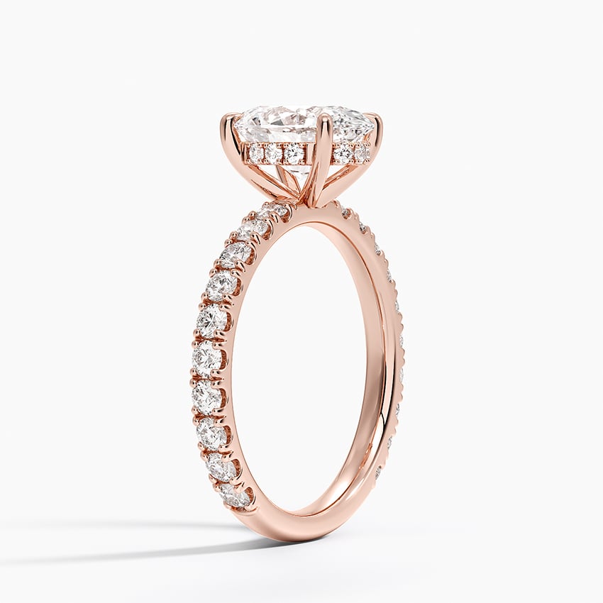 Pavé engagement ring setting in 14K rose gold, angled side view