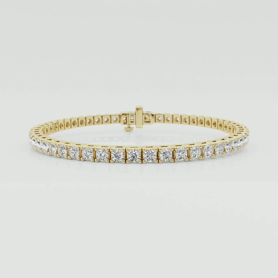 Classic four-prong tennis bracelet in 14K yellow gold, 360 view