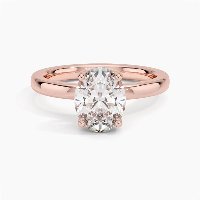 Solitaire engagement ring setting in 14K rose gold, rotating video