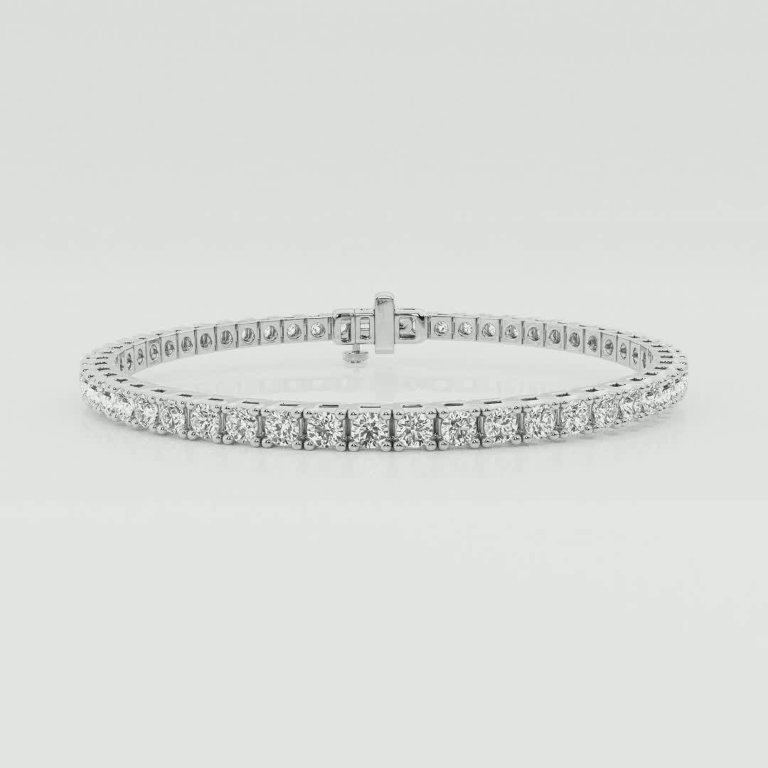 Classic four-prong tennis bracelet in 14K white gold, 360 view