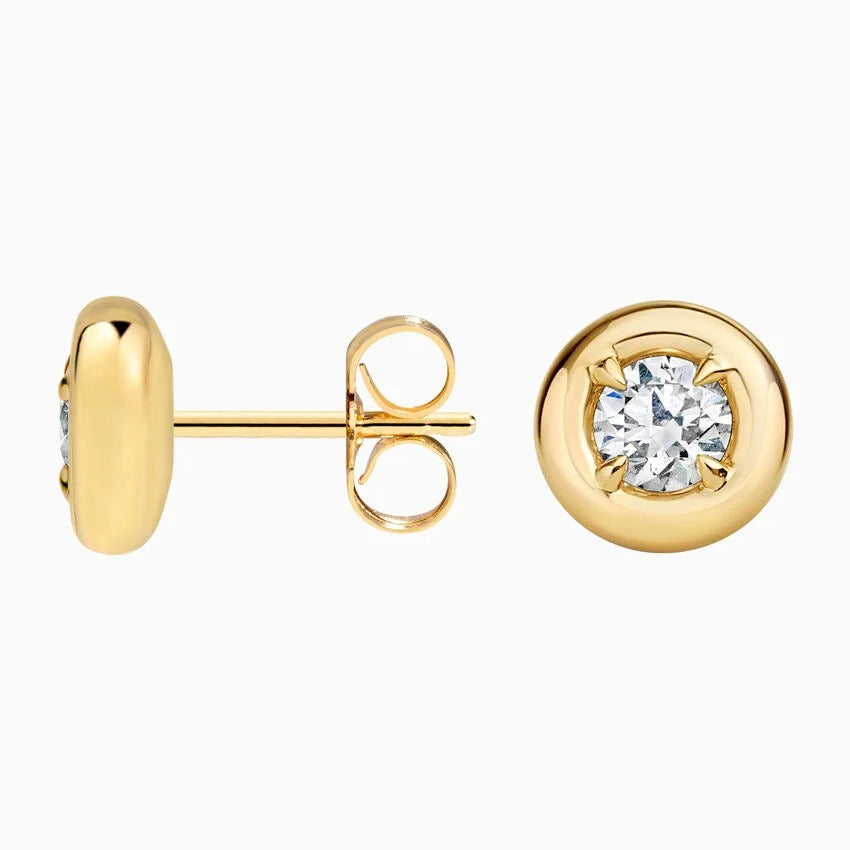 Side profile of yellow gold Solenne studs showing low-profile bezel and screw back post