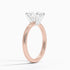 Solitaire engagement ring setting in 14K rose gold, angled side view