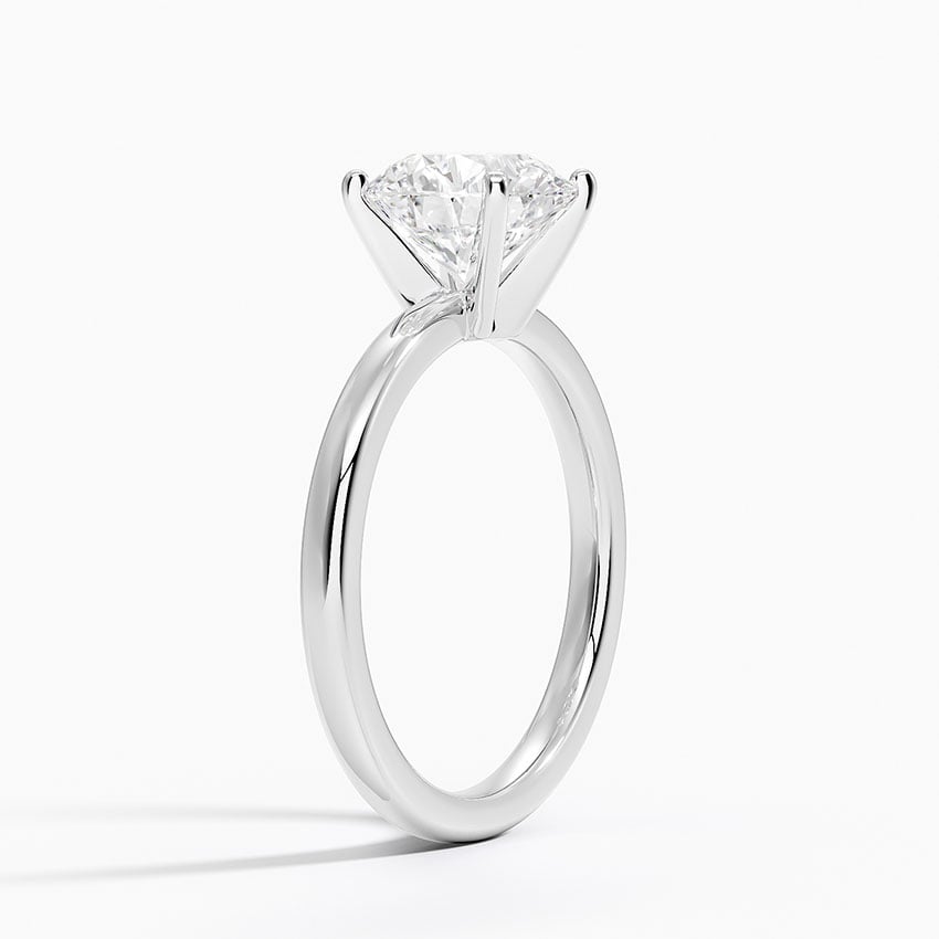 Solitaire engagement ring setting in 14K white gold, angled side view