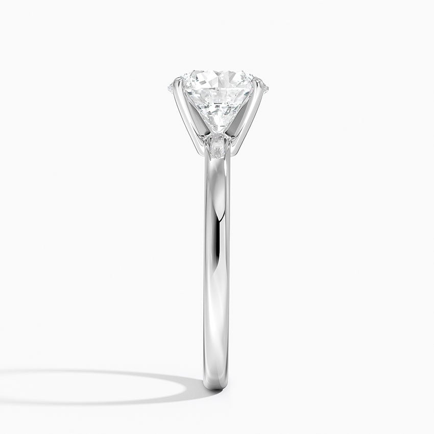 Solitaire engagement ring setting in 14K white gold, profile view