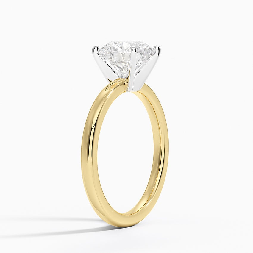 Solitaire engagement ring setting in 14K yellow gold, angled side view