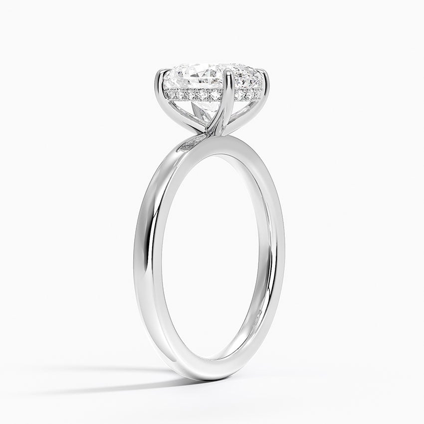 Solitaire engagement ring setting in 14K white gold, angled side view