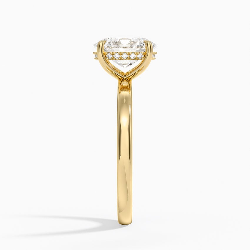 Solitaire engagement ring setting in 14K yellow gold, profile view