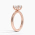Solitaire engagement ring setting in 14K rose gold, angled side view