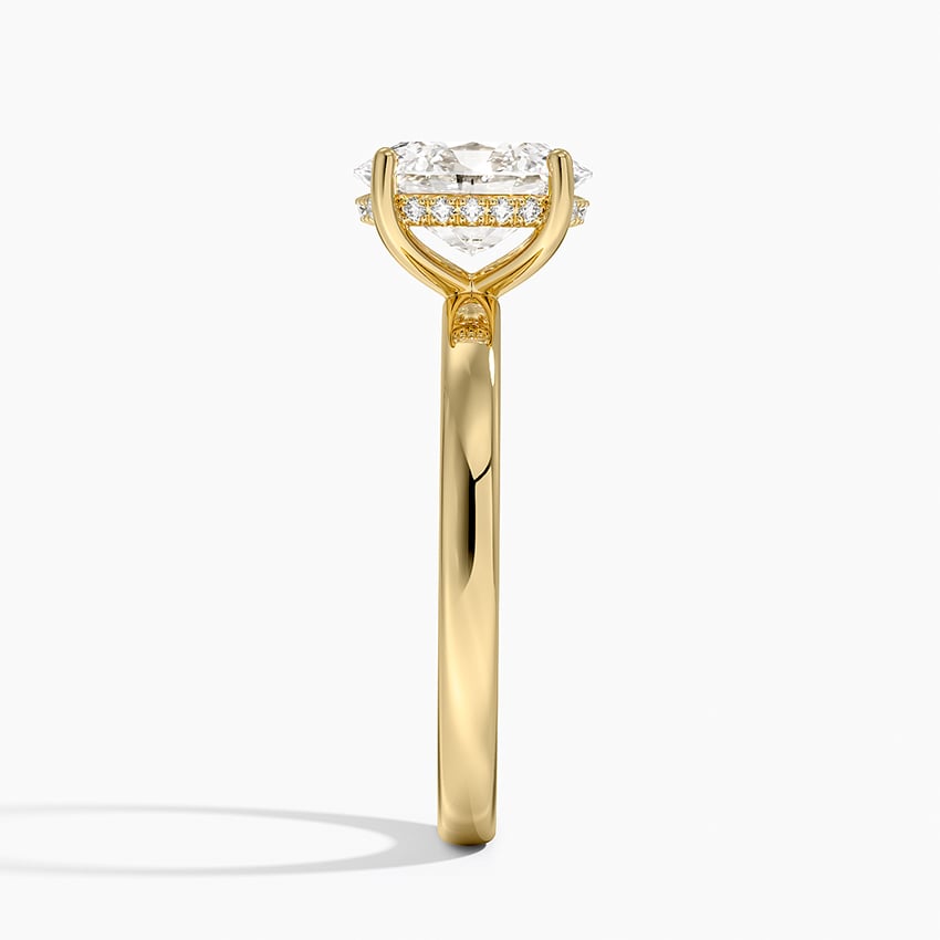 Solitaire engagement ring setting in 14K yellow gold, profile view